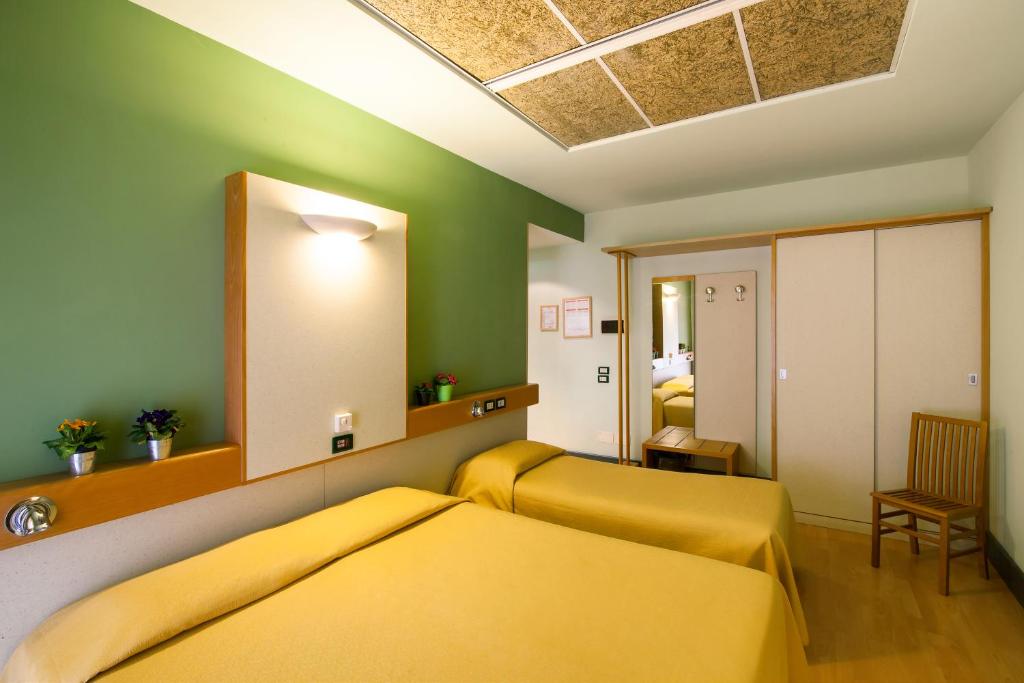 Postel nebo postele na pokoji v ubytování Duca Del Mare - Hotel Di Nardo group