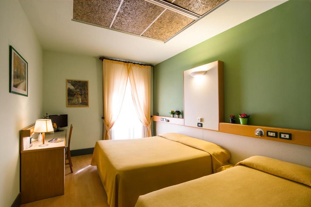 Postel nebo postele na pokoji v ubytování Duca Del Mare - Hotel Di Nardo group