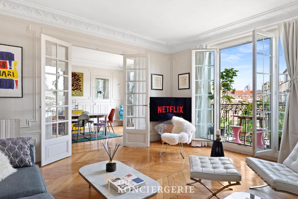Haussmannian 3BDR Apartment with Balcony