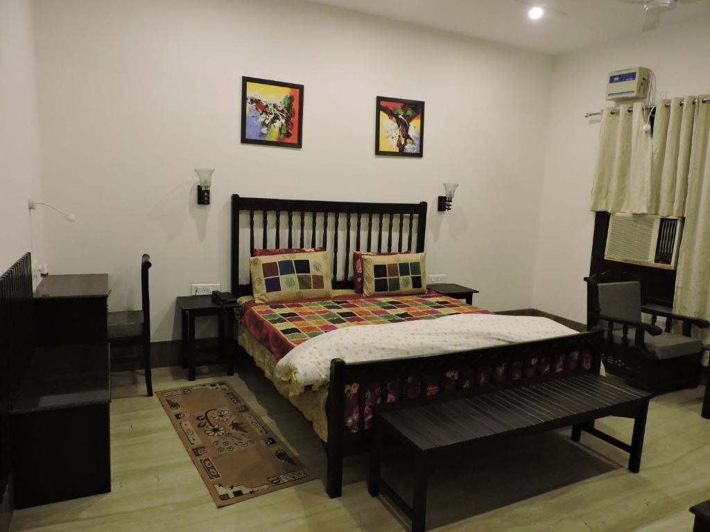 Postel nebo postele na pokoji v ubytování Pearl of Taj Home Stay