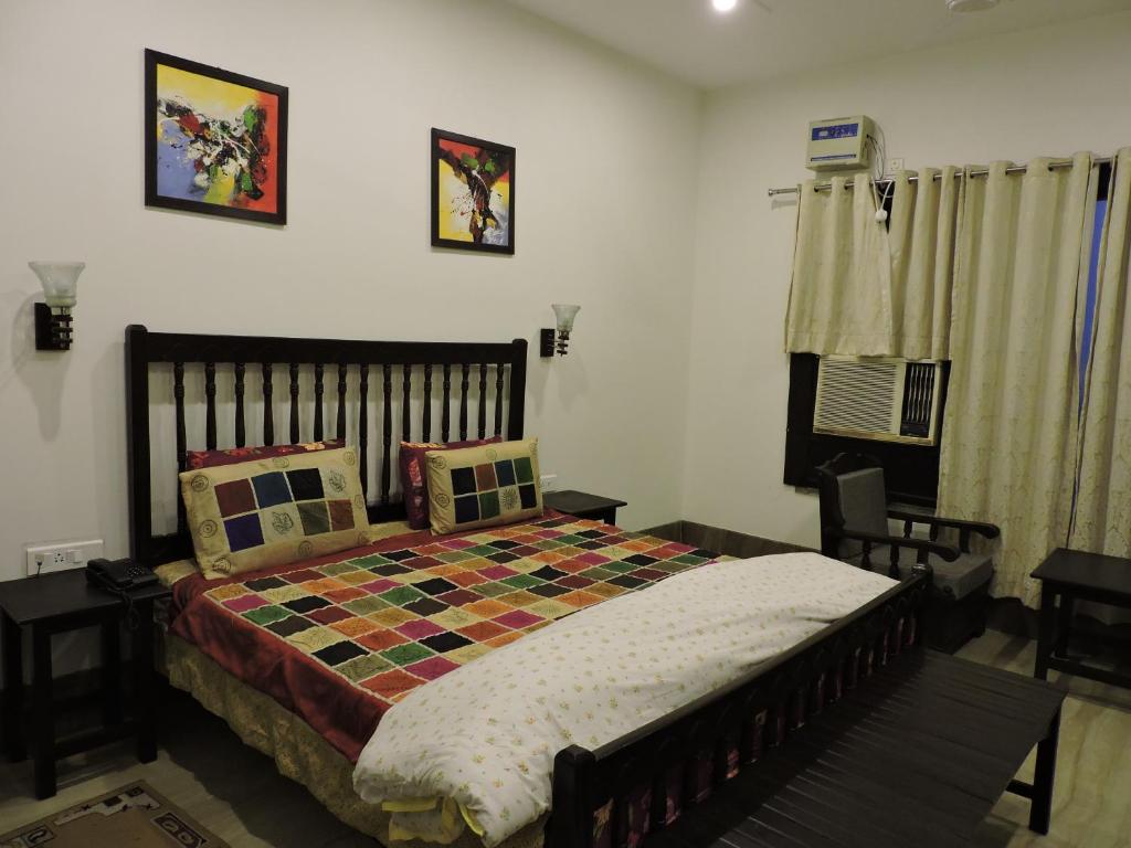 Postel nebo postele na pokoji v ubytování Pearl of Taj Home Stay