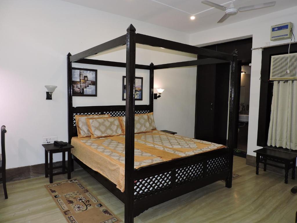 Postel nebo postele na pokoji v ubytování Pearl of Taj Home Stay