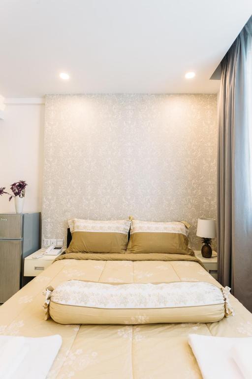 Postel nebo postele na pokoji v ubytování CA&SA Serviced Apartment