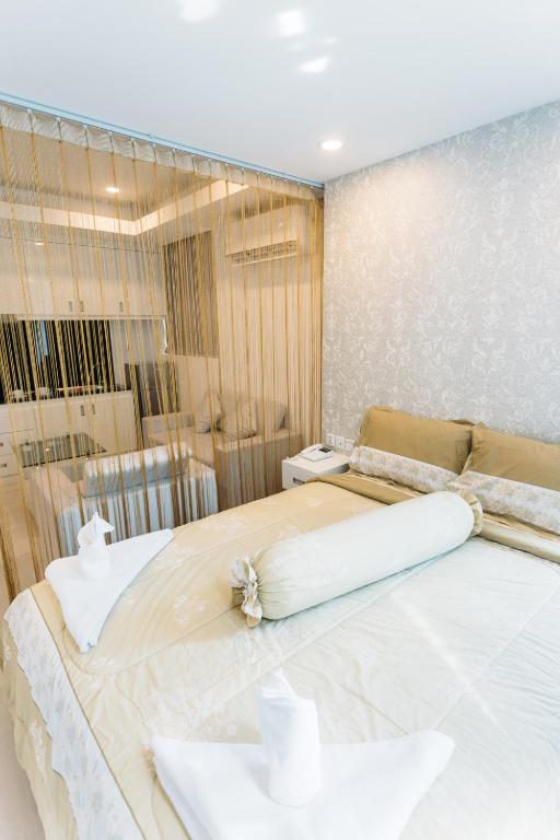 Postel nebo postele na pokoji v ubytování CA&SA Serviced Apartment