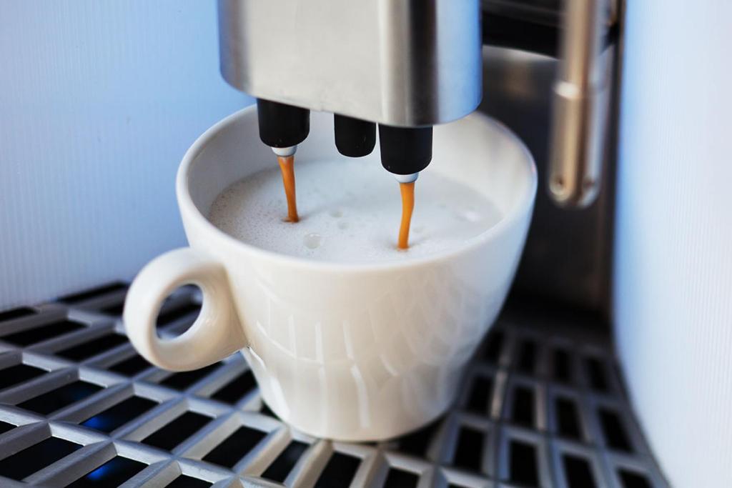 a coffee maker is making a cup of coffee at La Regence in Courbevoie