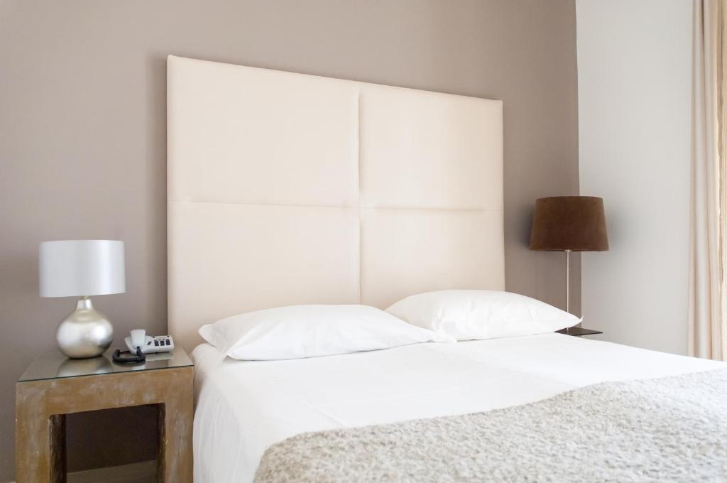 Postel nebo postele na pokoji v ubytování Soglow Business Class Hotel