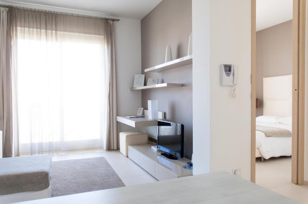 Postel nebo postele na pokoji v ubytování Soglow Business Class Hotel