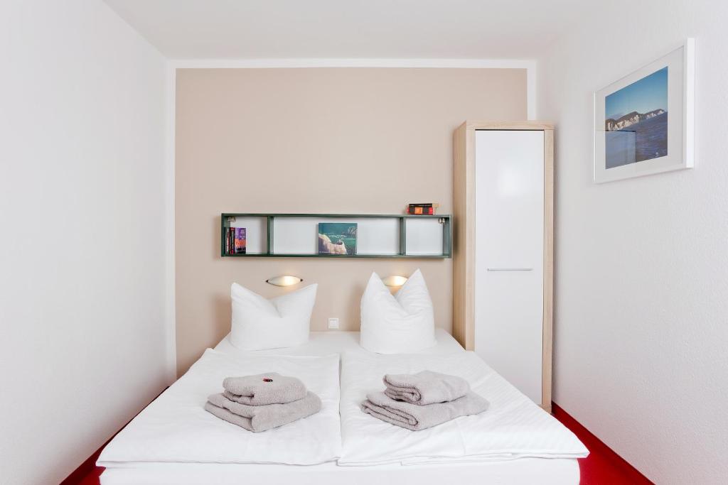 Postel nebo postele na pokoji v ubytování Haus Svantekahs