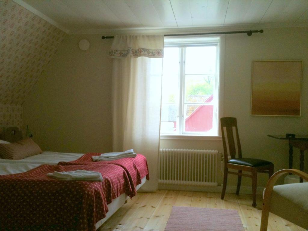 Postel nebo postele na pokoji v ubytování Allégården Kastlösa Hotell