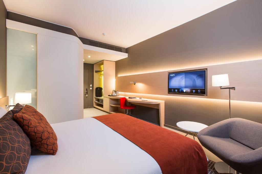 Postel nebo postele na pokoji v ubytování Noom Hotel Conakry