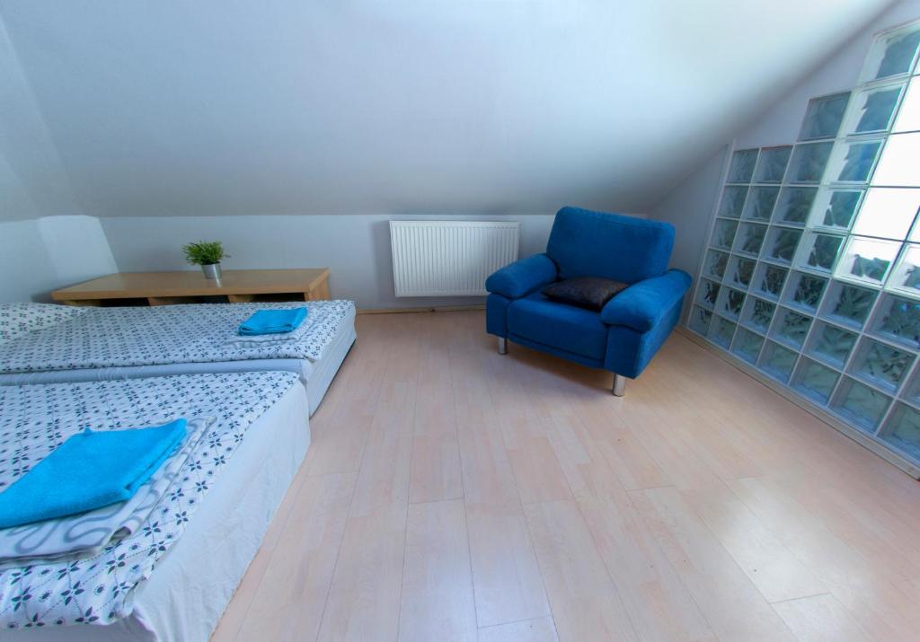 Posteľ alebo postele v izbe v ubytovaní Wilanowska Hostel