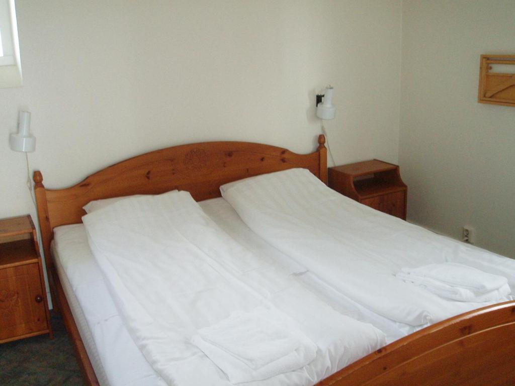 Postel nebo postele na pokoji v ubytování Hotell Dalsland