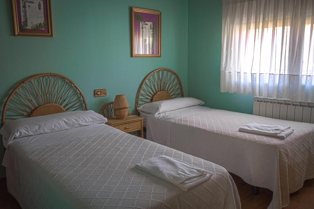 Postel nebo postele na pokoji v ubytování La Posada de Clotilde