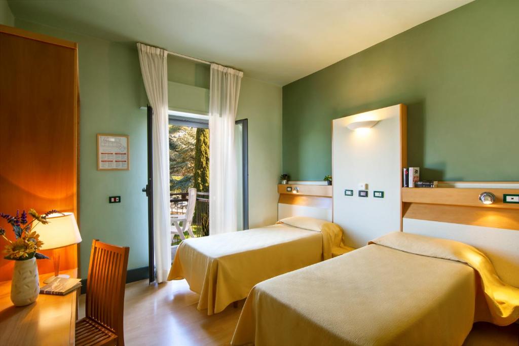 Postel nebo postele na pokoji v ubytování Duca Del Mare - Hotel Di Nardo group