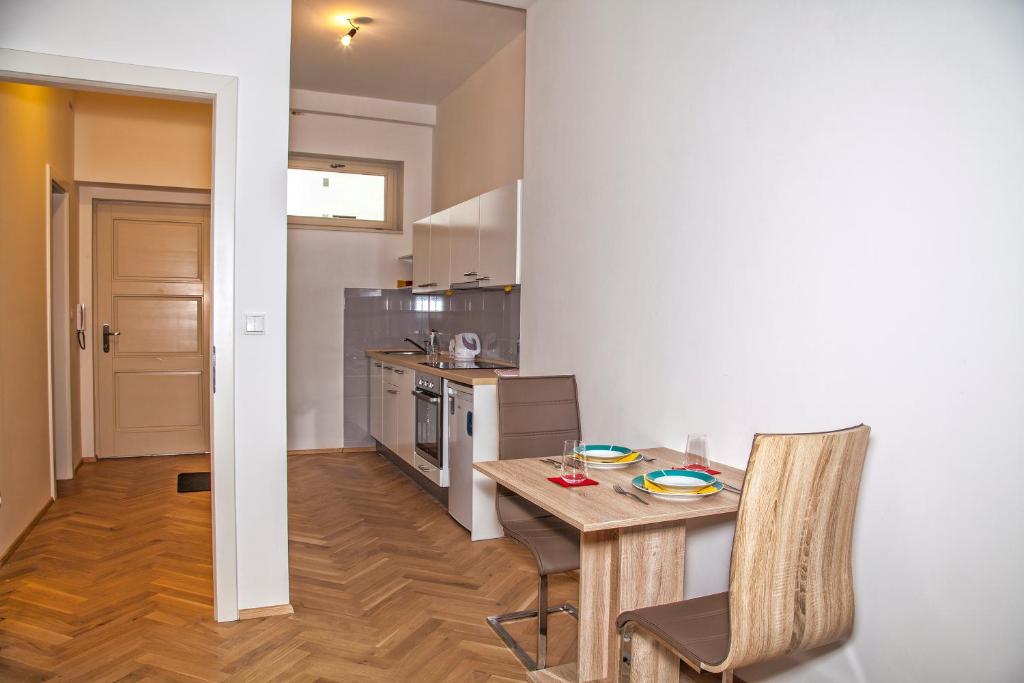 Kuchyň nebo kuchyňský kout v ubytování Beautiful Central Apartment Thámova
