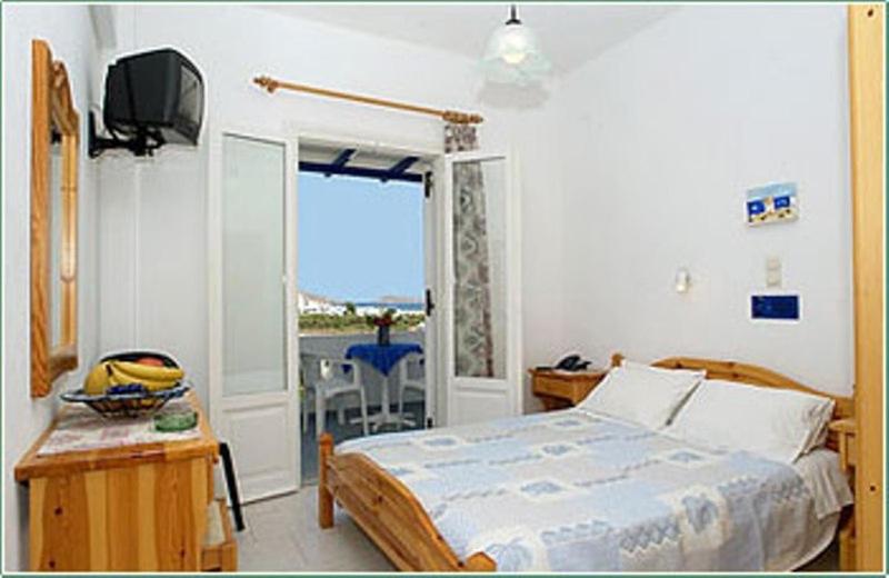 Posteľ alebo postele v izbe v ubytovaní Loukia Apartments & Studios