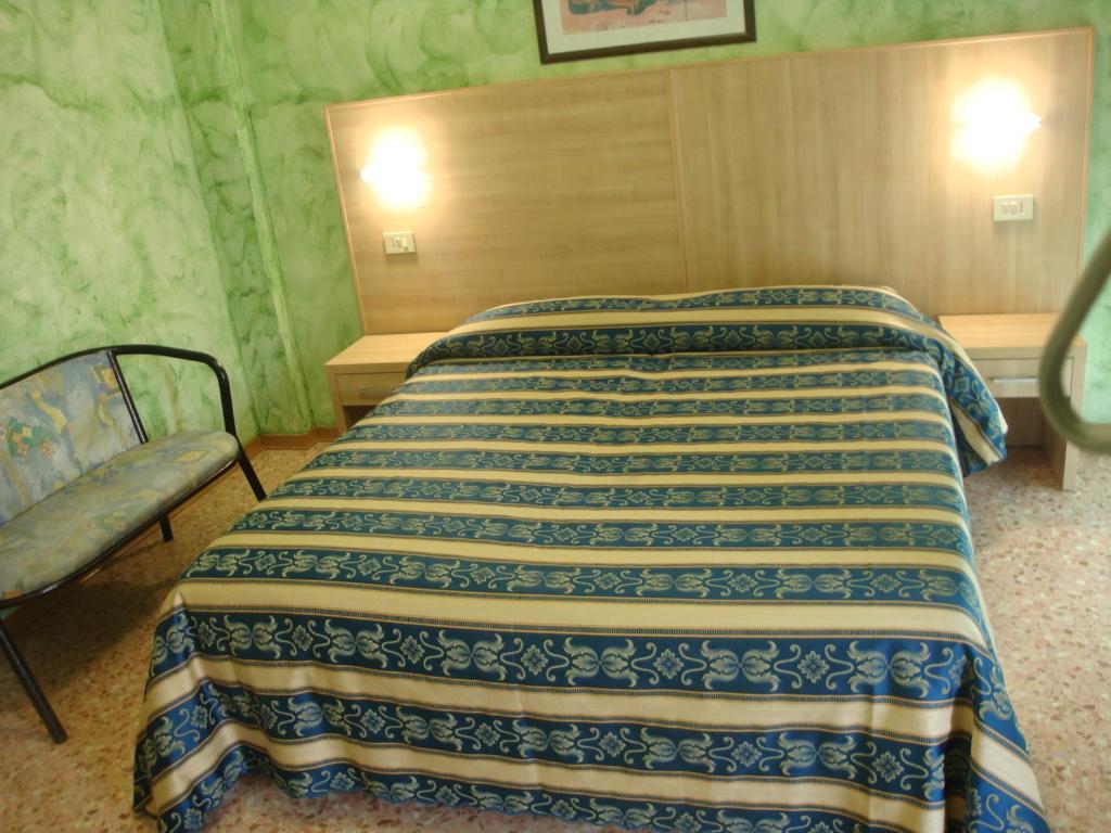 Postel nebo postele na pokoji v ubytování Hotel Bahamas