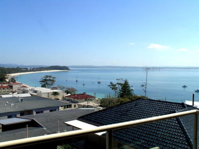 a view of a large body of water with boats at Blue Waters Unit 8 59 Ronald Avenue in Shoal Bay