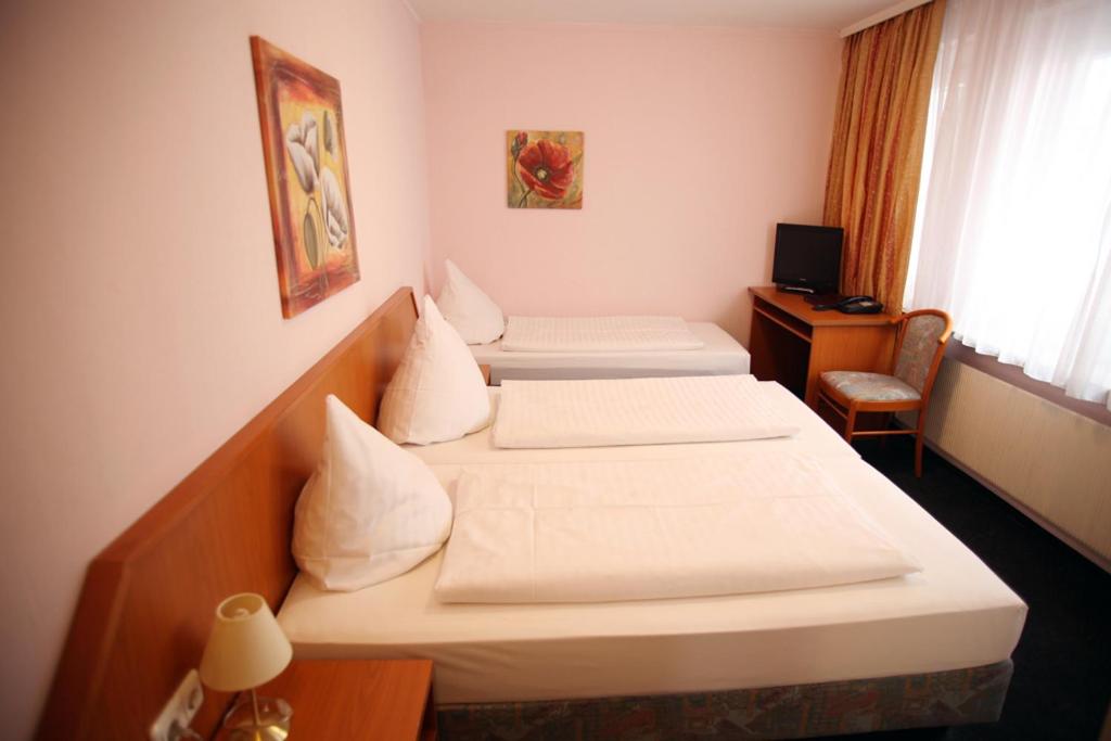 Voodi või voodid majutusasutuse Hotel Lafayette toas