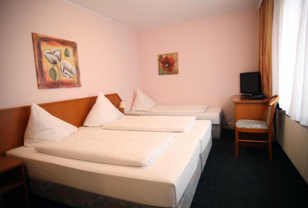 Voodi või voodid majutusasutuse Hotel Lafayette toas