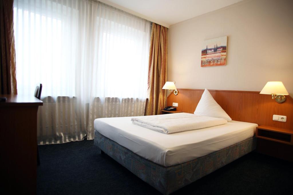 Voodi või voodid majutusasutuse Hotel Lafayette toas
