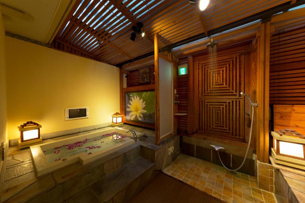 Postel nebo postele na pokoji v ubytování Hotel Lotus Nara (Adult Only)
