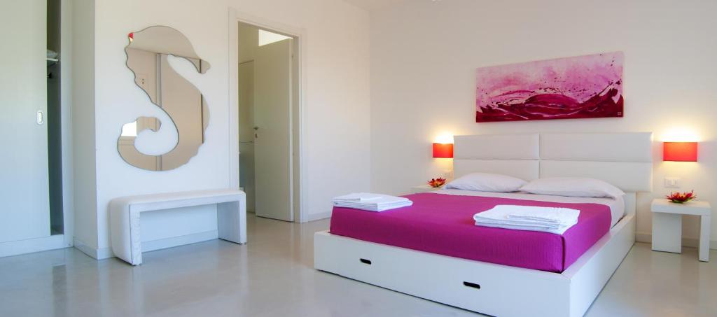 Postel nebo postele na pokoji v ubytování Hotel Beach Salento