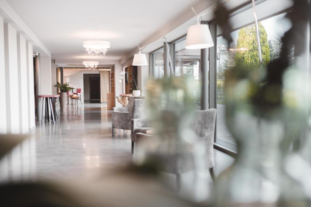 Posezení v ubytování Hotel Tiefenbrunn Gardensuites & Breakfast