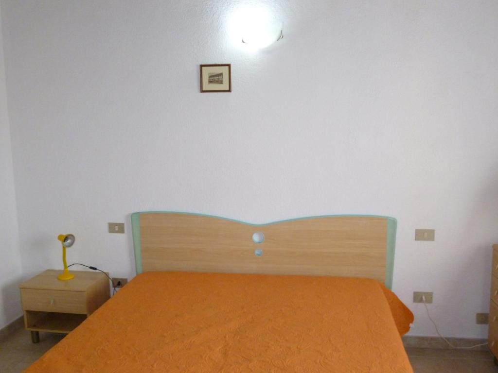 Łóżko lub łóżka w pokoju w obiekcie Le Villette al Centro