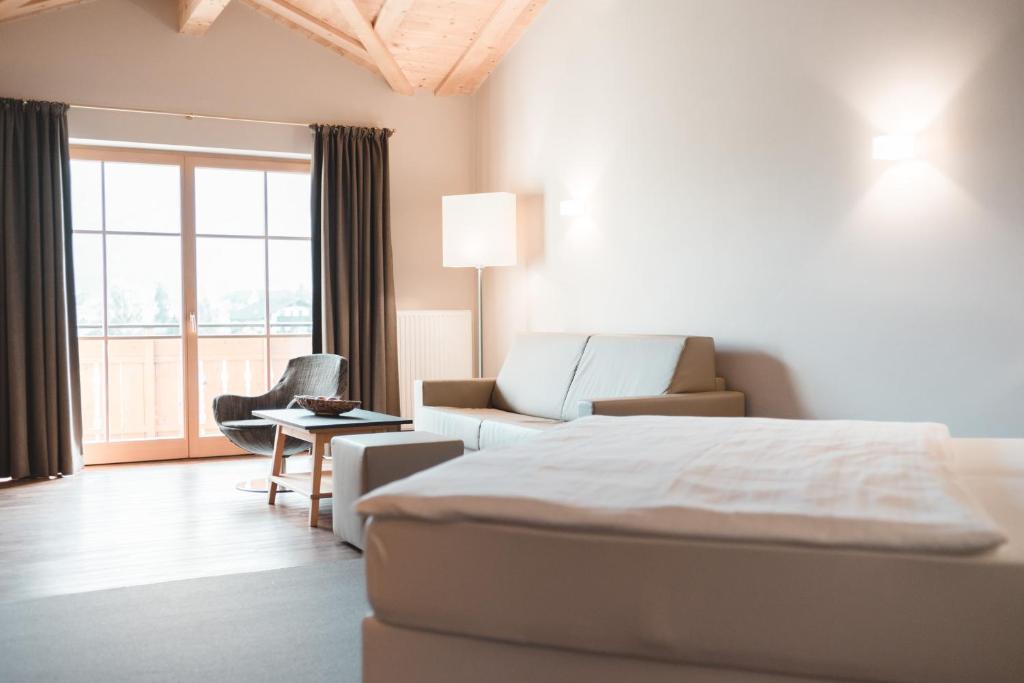 Posezení v ubytování Hotel Tiefenbrunn Gardensuites & Breakfast