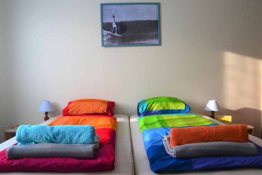 Postel nebo postele na pokoji v ubytování Surf House Peniche