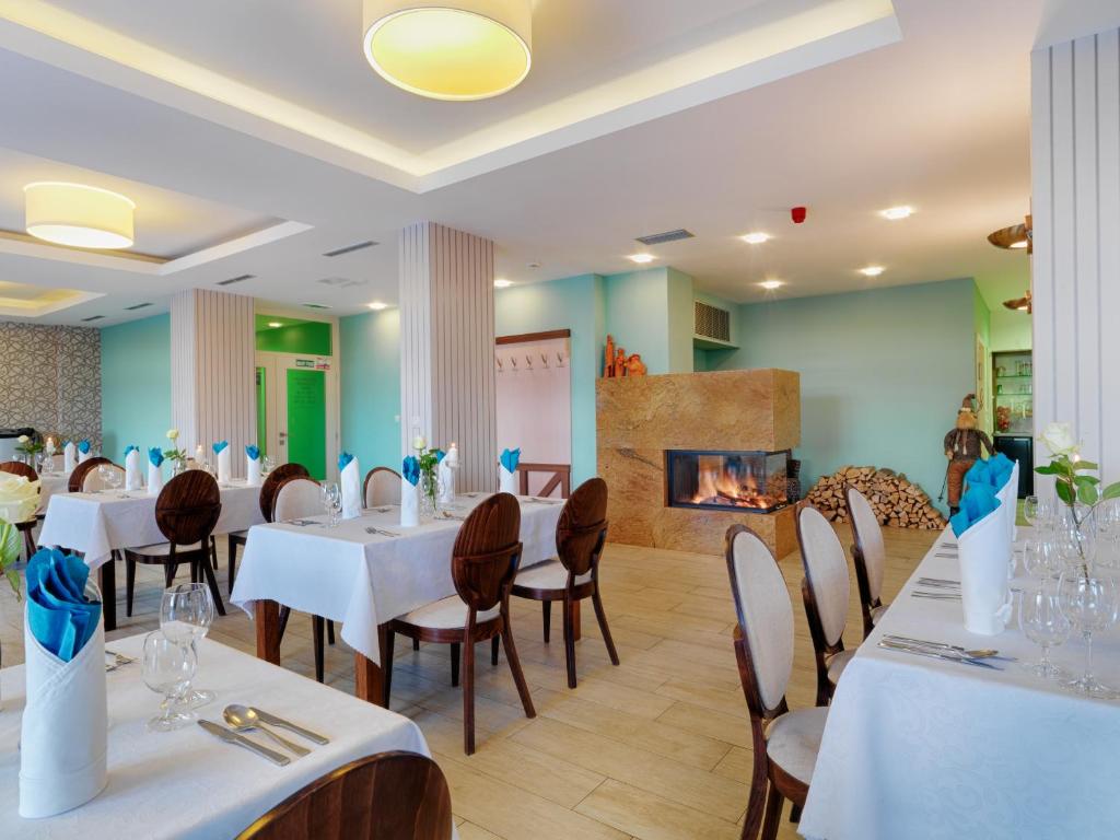 TV a/nebo společenská místnost v ubytování Hotel Green