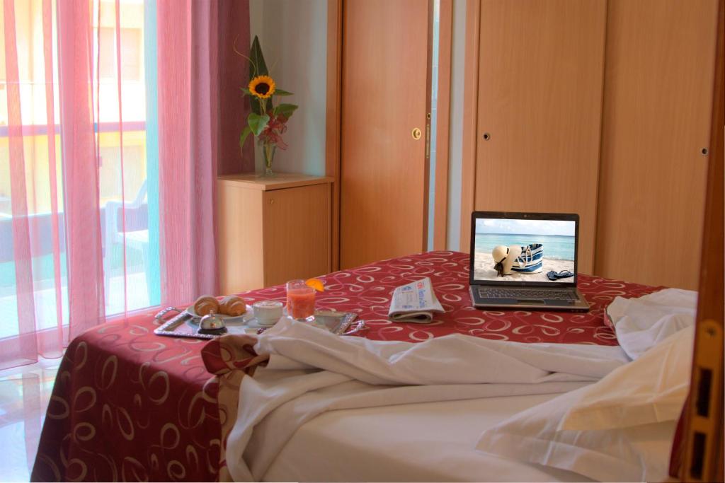Postel nebo postele na pokoji v ubytování Hotel Hamilton
