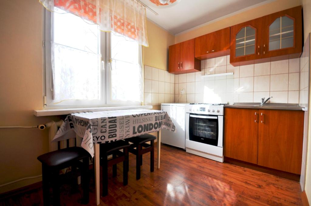 Η κουζίνα ή μικρή κουζίνα στο Apartament Bachusik