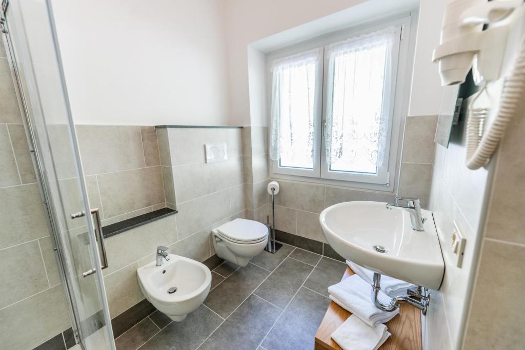 Koupelna v ubytování Hotel Paradiso