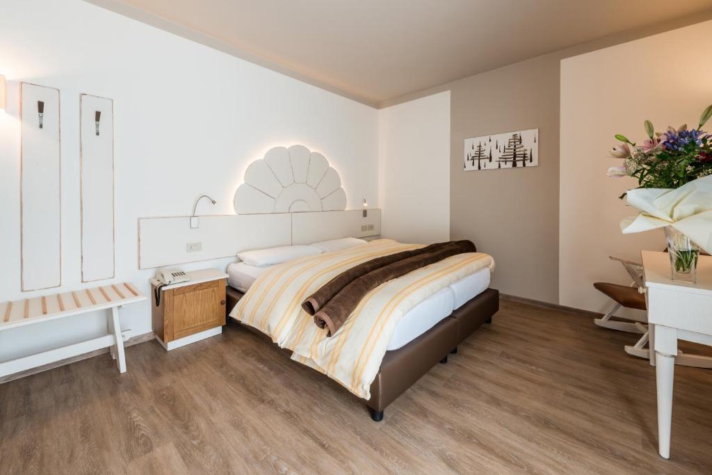 Postel nebo postele na pokoji v ubytování Hotel Paradiso
