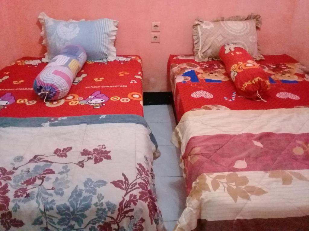 Postel nebo postele na pokoji v ubytování Diyah Homestay
