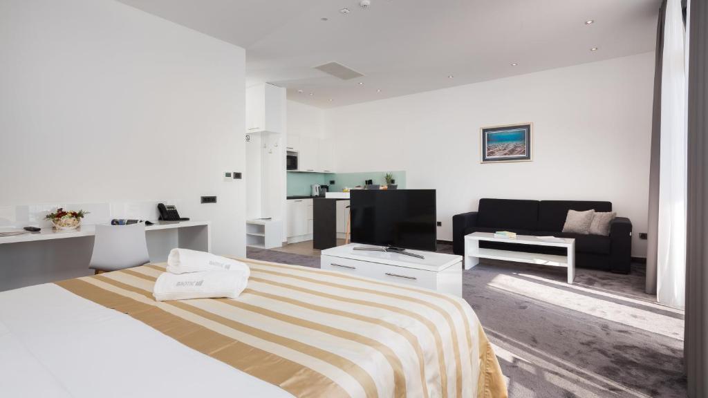 Posteľ alebo postele v izbe v ubytovaní Marina Baotić Apartments