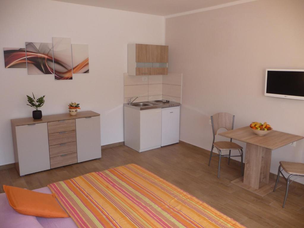 Kuchyň nebo kuchyňský kout v ubytování Apartments & Rooms Milka