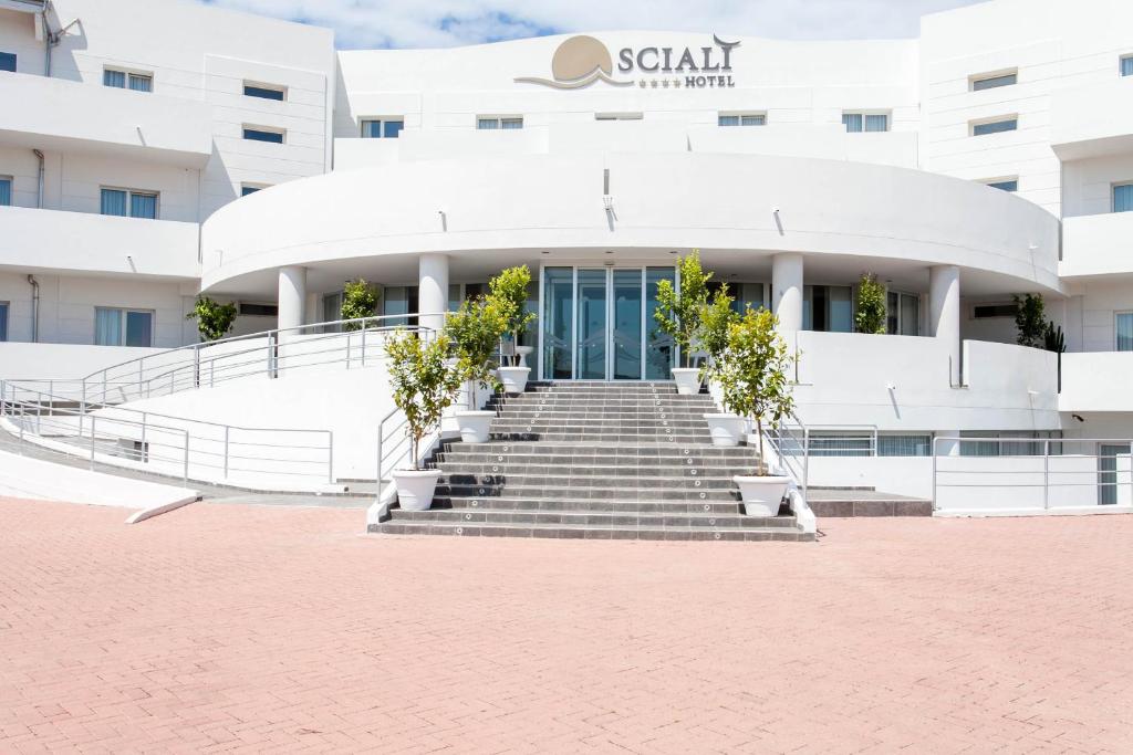 a building with stairs in front of it at Hotel Scialì in Vieste