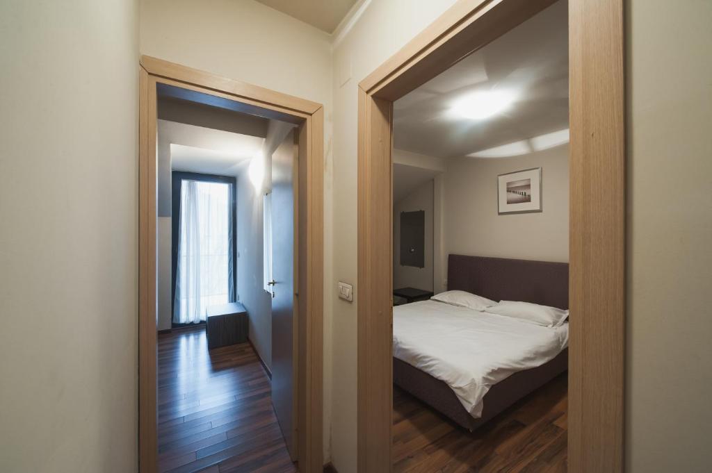 Postel nebo postele na pokoji v ubytování Hotel Hemingway Residence