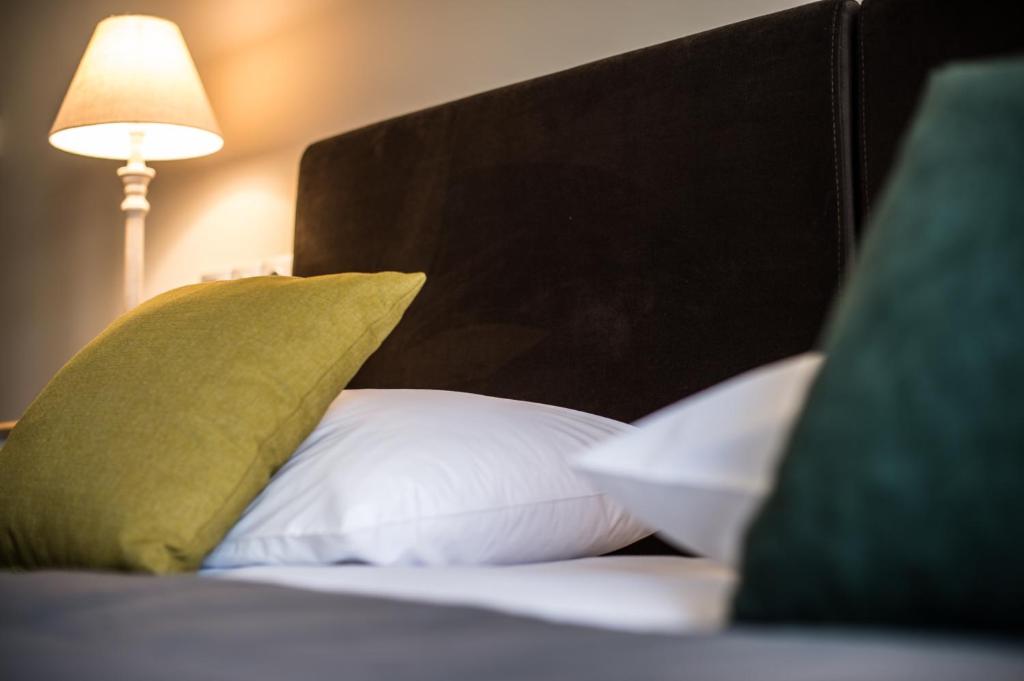 Postel nebo postele na pokoji v ubytování Filoxenia Hotel & Spa