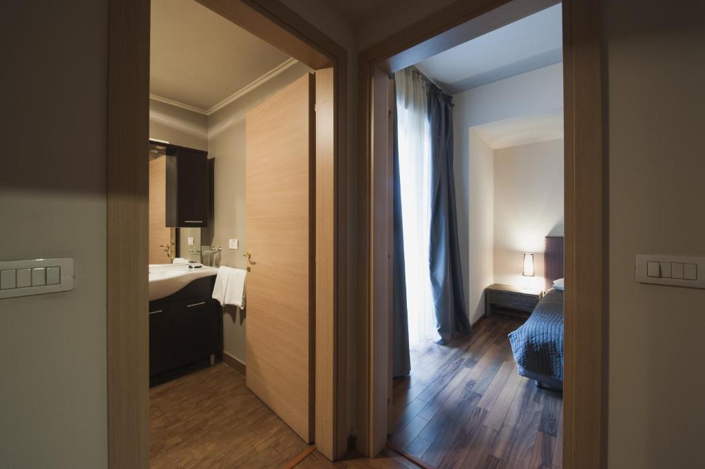 Postel nebo postele na pokoji v ubytování Hotel Hemingway Residence