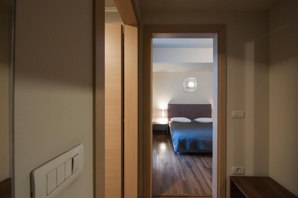 Postel nebo postele na pokoji v ubytování Hotel Hemingway Residence