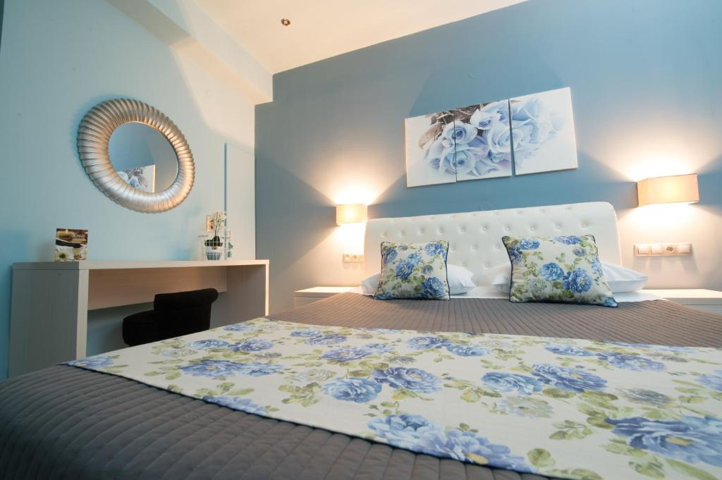 Postel nebo postele na pokoji v ubytování Filoxenia Hotel & Spa