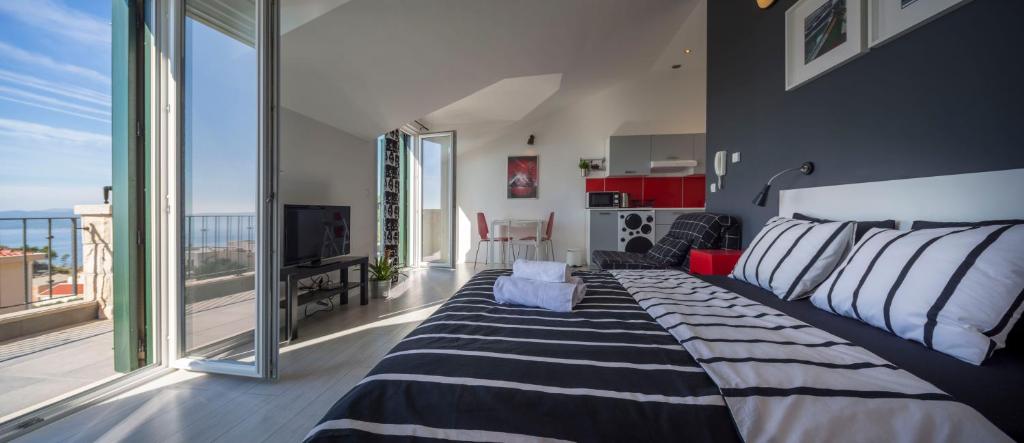 Posteľ alebo postele v izbe v ubytovaní Apartments Denis