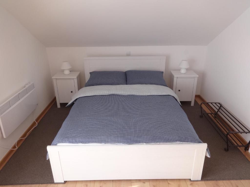 Posteľ alebo postele v izbe v ubytovaní VIP Apartments & Room