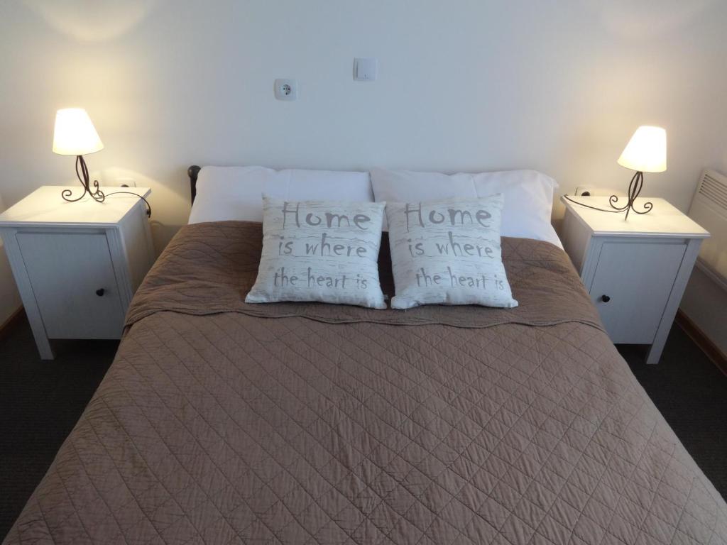 Posteľ alebo postele v izbe v ubytovaní VIP Apartments & Room