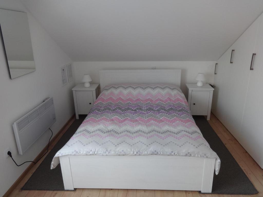Posteľ alebo postele v izbe v ubytovaní VIP Apartments & Room