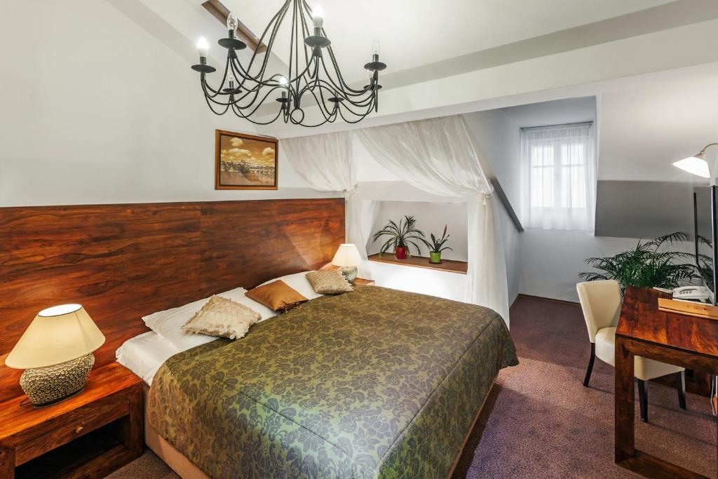 Кровать или кровати в номере Hotel Residence Agnes